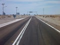 Asphalt road in atacama desert in chile Royalty Free Stock Photo