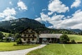 Austria - July, 2019: Asphalt road in Austria, Alps in a beautiful summer day Royalty Free Stock Photo