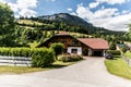 Austria - July, 2019: Asphalt road in Austria, Alps in a beautiful summer day Royalty Free Stock Photo