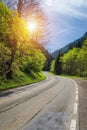 Asphalt road in Austria through the forest, valley in Austria in Royalty Free Stock Photo