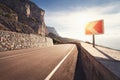 Asphalt road in autumn forest at sunrise. Crimean mountains Royalty Free Stock Photo