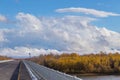 Asphalt road on the bridge over Kamchatka River. Kamchatka Peninsula, Russia.