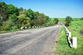 Asphalt road broken in field Royalty Free Stock Photo