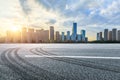 Asphalt road and Chongqing cityscape at sunset Royalty Free Stock Photo