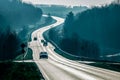 Asphalt road countryside with cars