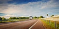 Closeup of a lorry moving on the road Royalty Free Stock Photo