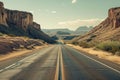 Asphalt road in desert canyons under daylight Royalty Free Stock Photo