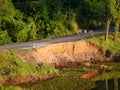 Asphalt road destroyed by the landslide, Asphalt road collapsed with cracks Royalty Free Stock Photo