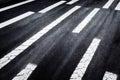 Asphalt road highway traffic surface with white safety striped marking dividing lines abstract grunge background