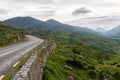 Asphalt road and hills at connemara in ireland Royalty Free Stock Photo