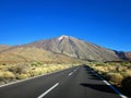 Asphalt road leading to el Teide volcano in the National Park of Tenerife Canary Islands Spain Royalty Free Stock Photo