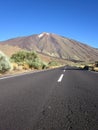 Asphalt road leading to el Teide volcano in the National Park of Tenerife Canary Islands Spain Royalty Free Stock Photo