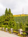 Asphalt road leading to TV transmitter and lookout tower on the summit of Praded Mountain, Hruby Jesenik, Czech Republic Royalty Free Stock Photo