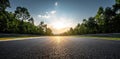 Sunlit Race Track at Golden Hour Amid Green Forests Royalty Free Stock Photo
