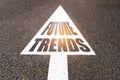 On the asphalt road markings an arrow with the inscription - FUTURE TRENDS Royalty Free Stock Photo