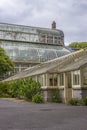 Asphalt road with meadows and plants near a greenhouse in National Botanic Gardens Royalty Free Stock Photo