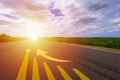 Asphalt road in the morning with sunshine and clould  The road with yellow business candle stick graph chart and arrow of stock Royalty Free Stock Photo