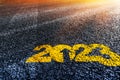 2023 Asphalt road motivational writing 2023 as a metaphor for moving forward like on tarmac highway