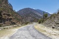 Asphalt road through the mountains in Eastern Bhutan Royalty Free Stock Photo