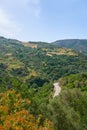 Asphalt road in the mountains on the island of Crete. Royalty Free Stock Photo