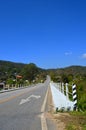 On Asphalt Road pass Country Village 1_1, Bridge, Direction, Traffic Sign, Maehongson, Thailand Royalty Free Stock Photo