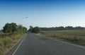 Road with nature of pineapple plantation at upcountry. Royalty Free Stock Photo