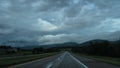 Asphalt road in a rural area on a cloudy evening, McHenry, Maryland