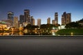 Asphalt road side with beautiful Kuala Lumpur city skyline Royalty Free Stock Photo