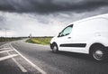 Asphalt road on with a small truck Royalty Free Stock Photo