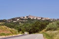 Asphalt road to the city of Manciano