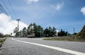 Asphalt road with the truck drives up the hill