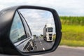 Truck reflected in car mirror Royalty Free Stock Photo