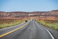 Asphalt road in USA. Empty asphalt highway and blue sky. Long Desert Highway California. Royalty Free Stock Photo