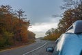 Asphalt road in yellow autumn forest Royalty Free Stock Photo