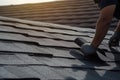 A asphalt shingles installation on the roof roofer