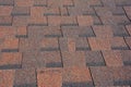 Asphalt Shingles Textured Background Photo. Red Roof Shingles - Roofing Construction, Roofing Repair Royalty Free Stock Photo