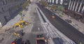 Asphalt spreading machine and vibration roller at pavement road works aerial