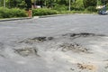 Asphalt surface on the car park was demolished due Royalty Free Stock Photo