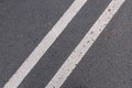 Asphalt texture with double solid line prohibiting overtaking Royalty Free Stock Photo