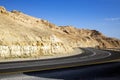 Asphalt winding road in the Judean desert among the Eilat mountains Royalty Free Stock Photo