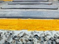 Asphalt with yellow stripes on city street corners Royalty Free Stock Photo