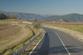 Asphalted provincial road crosses the hills of Tuscany Royalty Free Stock Photo