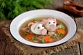 Aspic with meat, pork jelly is a festive traditional Russian dish decorated with boiled eggs in the form of cute pigs. Royalty Free Stock Photo