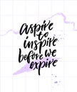 Aspire to inspire before we expire. Inspirational quote poster on abstract pastel violet background with brush strokes.