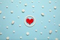 Aspirin tablets and red heart. Cardiology and medicine, healthcare and pharmacy concept Royalty Free Stock Photo