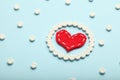 Aspirin tablets and red heart. Cardiology and medicine, healthcare and pharmacy concept Royalty Free Stock Photo