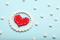 Aspirin tablets and red heart. Cardiology and medicine, healthcare and pharmacy concept Royalty Free Stock Photo