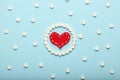 Aspirin tablets and red heart. Cardiology and medicine, healthcare and pharmacy concept Royalty Free Stock Photo