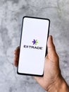 Assam, india - Augest 2, 2020 : Extrade/E*trade financial corporation logo displayed on a smartphone.