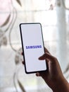 Assam, india - Augest 9, 2020 : Samsung logo on a phone screen stock image.